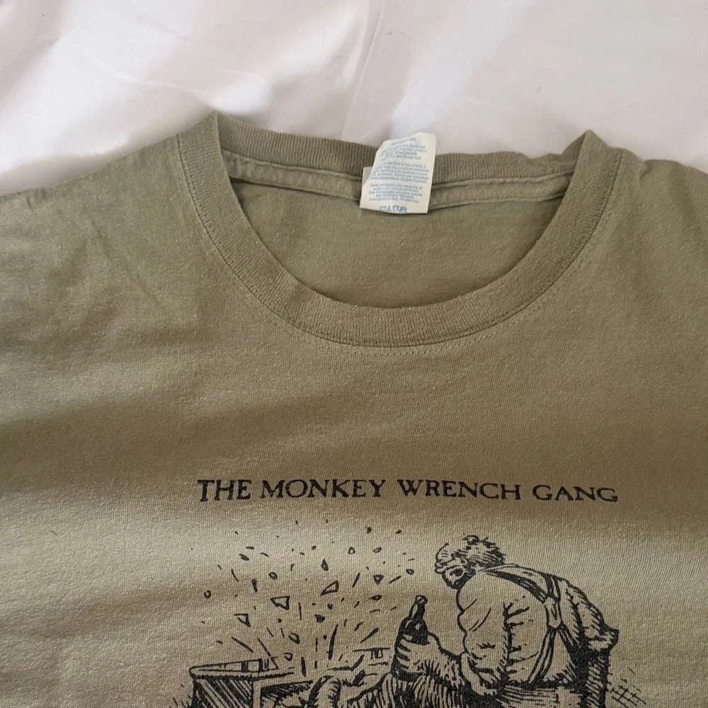 Port and Company Olive Green 'The Monkey Wrench Gang' Doc Sarvis Graphic Tee - Picture 6 of 7